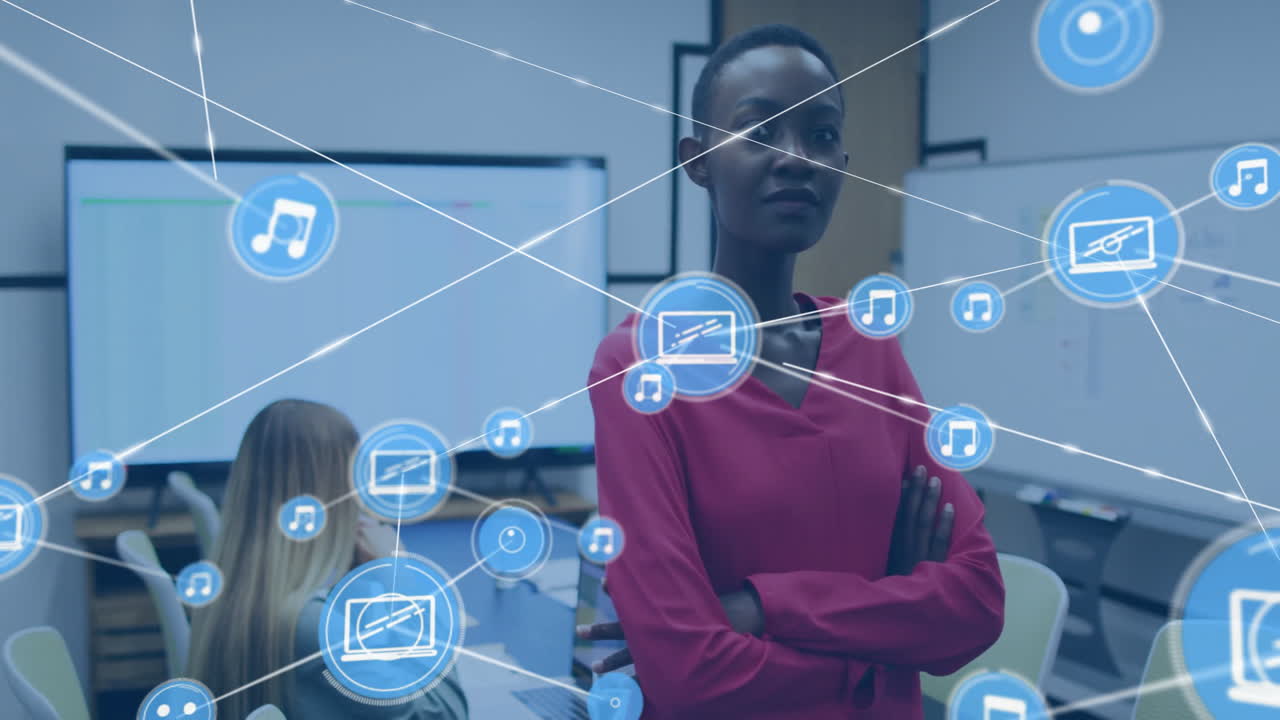 Animation of network of connections with devices icons over diverse business people in office