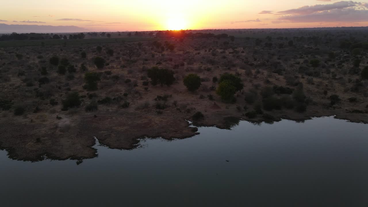 African Sunrise overlooking a dam