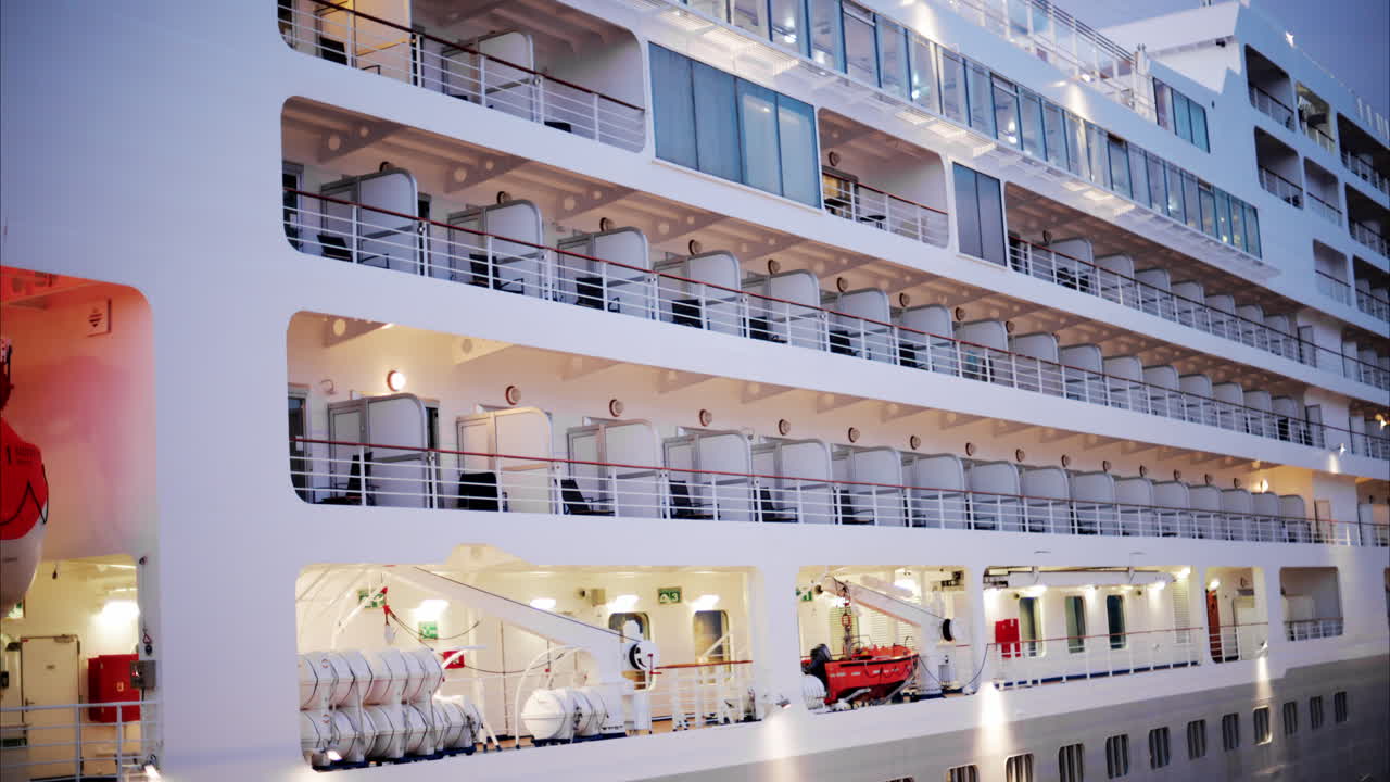 Large cruise ship docked in the Monaco Marina in the evening