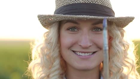 artist girl paints a picture outdoors