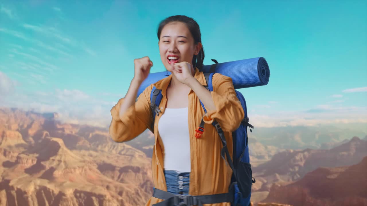 Asian Female Hiker With Mountaineering Backpack Enjoy Dancing While Traveling At The Top Of Mountain
