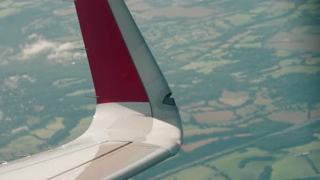 airbus a320 neo strobe lights, nav lights and winglets filmed during flight closeup