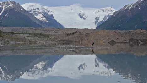 icefalls and root glacier hiker water reflection in mccarthy alaska