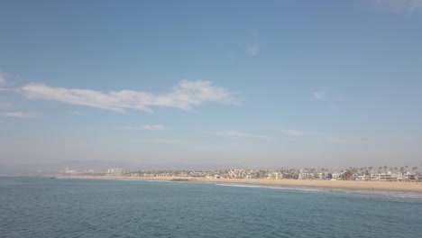 Beautiful seascape on a blue sky day and city in the background