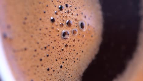 close-up of coffee crema with rich bubbles