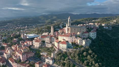 san giovanni battista catholic church overlooking ancient town cervo, aerial