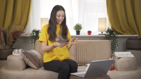 Female-student-doing-e-commerce-shopping.