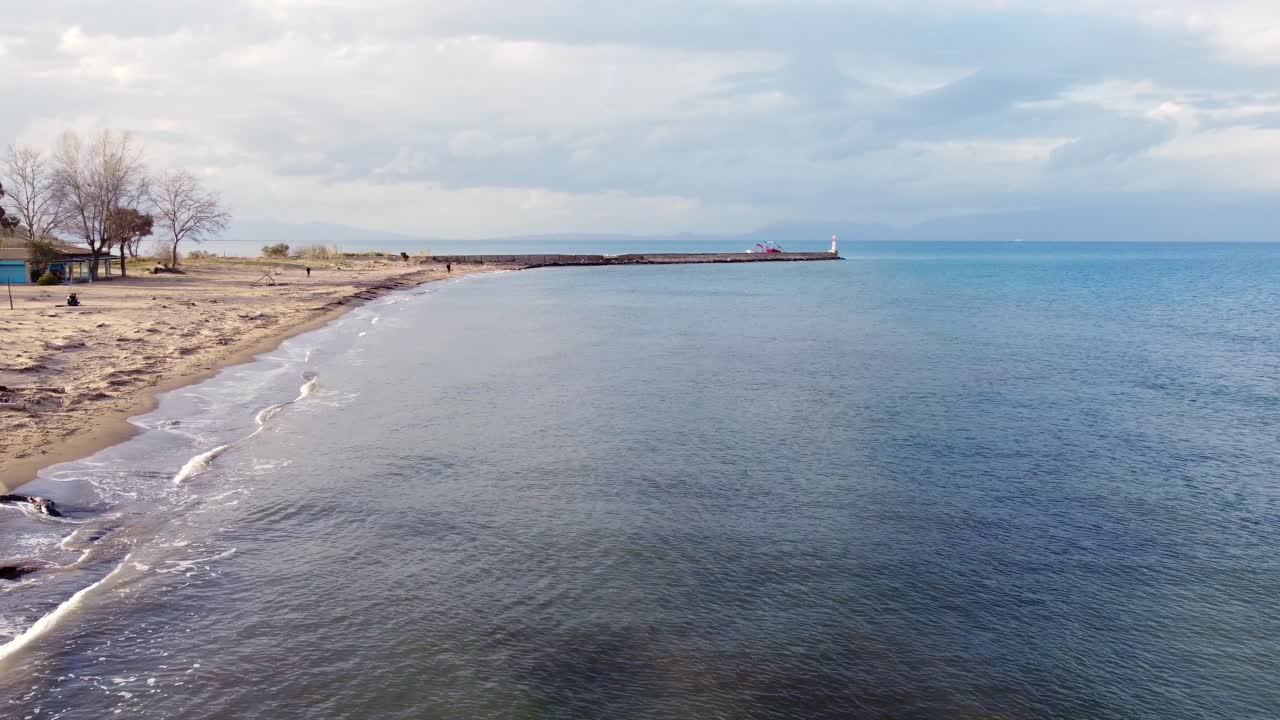 Buttery soft aerial view flight fly forwards drone footage natural golden sand Bouka Beach at Corfu Greece is a untouched nature adventure paradis 4k Cinematic view from above by Philipp Marnitz 2022