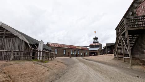 walking through historic buildings and dirt paths