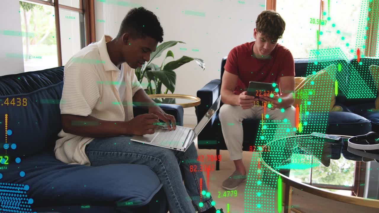 Two men typing and tapping tablet in lounge producing market charts overlaying scene for analysis