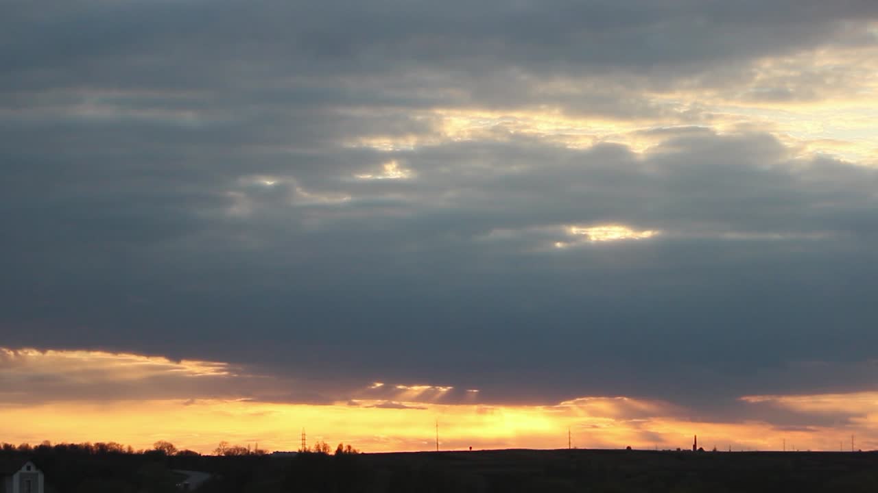 Dramatic Sunset with Clouds and Light Rays