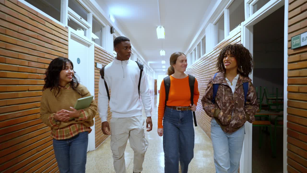 Group of students walking in a school hallway