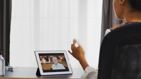 Cheerful-woman-in-a-video-call-with-her-mother