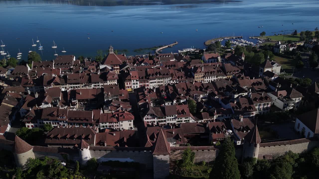 Switzerland Murten medieval town Morat fortified walls aerial drone lake
