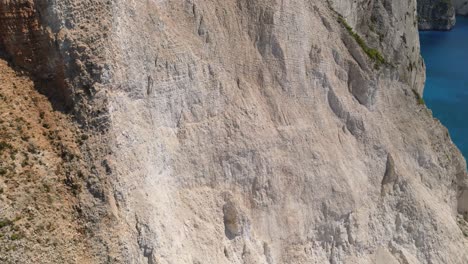 Beautiful-white-cliff-dy-the-Mizithres-rock-formation-in-Ionian-sea