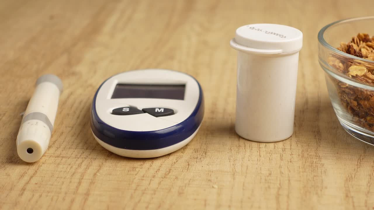 Blood Glucose Meter, Pills, and Granola for Diabetes Management