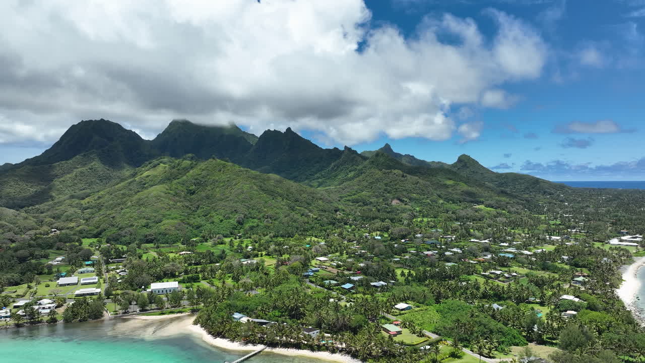 Aerial pullback over Avana Passage and Garden of Seven Stones in Cook Islands Rarotonga