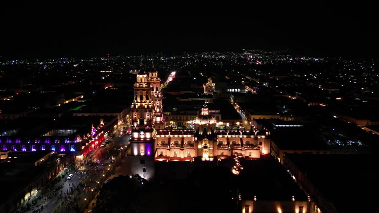 Morelia Cathedral in the historic center. Cathedral lighting ceremony. Drone shot.