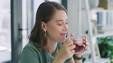 a young businesswoman having a tea break