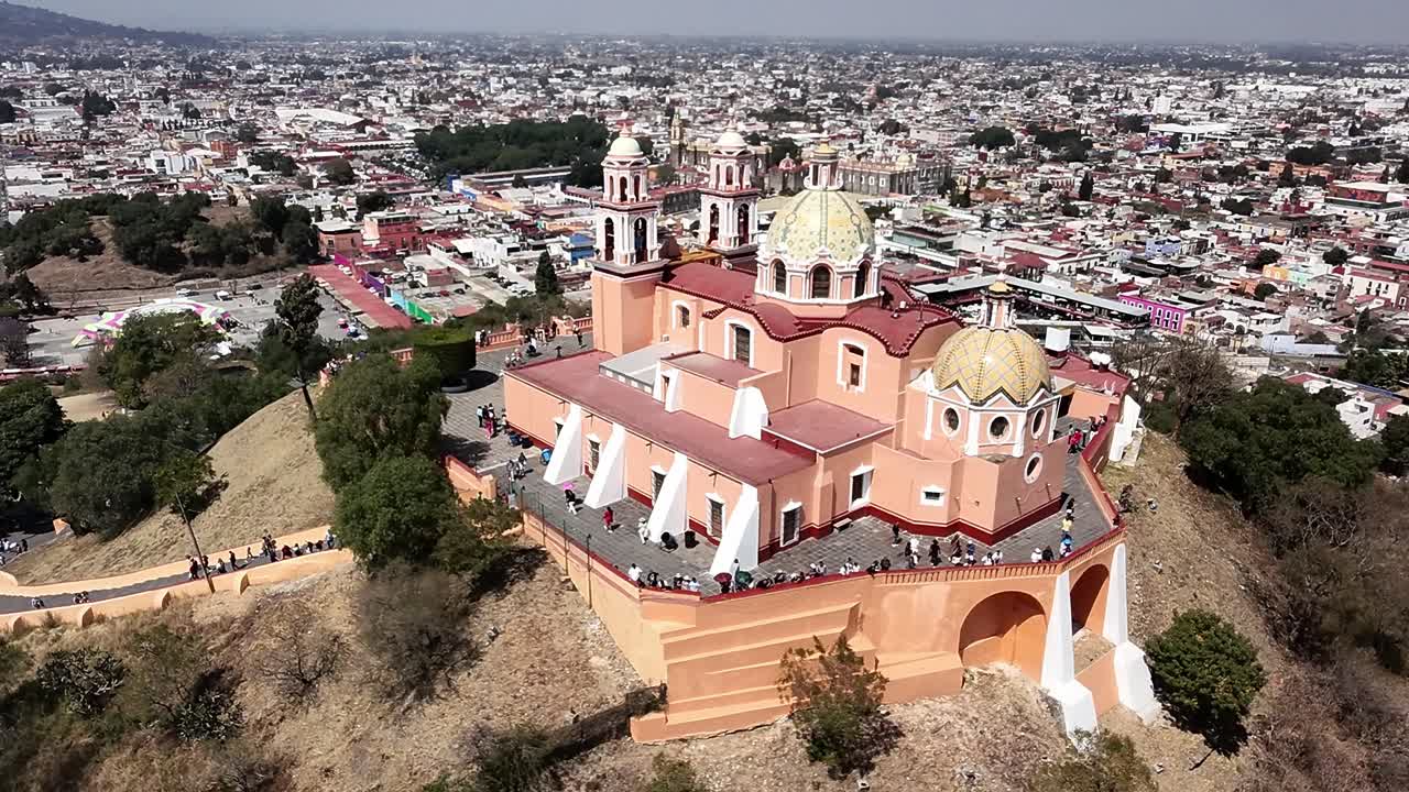 Aerial view of Cholula Puebla's vibrant historic church and cityscape