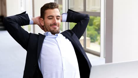 businessman working on laptop at desk 4k