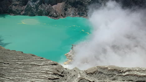 ijen volcano indonesia blue lake fire acidic crater drone