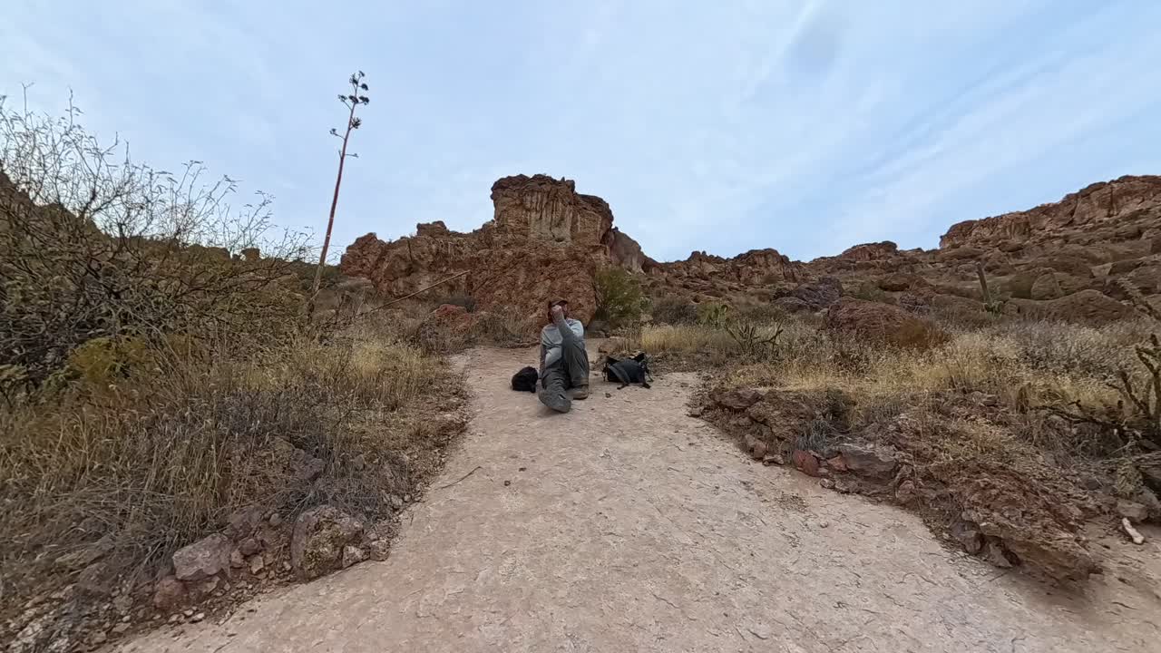 Cloud Time Lapse of a hiker on the Peralta Trail in the Superstition Mountains