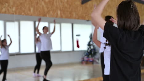 Teacher-and-pupils-in-dance-class