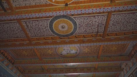 ornate buddhist hand painted ceiling