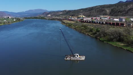 efficiency afloat: kamloops' crane barge and the thompson river's transport