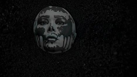 black and white image of a female mannequin head with dripping black paint floating in a dark space full of dust particles, creating a chilling, horror, halloween atmosphere