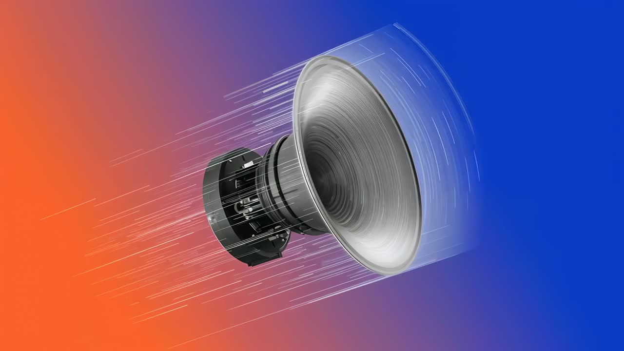 Rotating speaker driver on play, centering on orange-blue gradient, showing streaks for energy