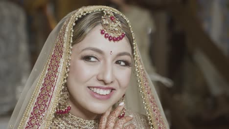 the stunning indian bride in her bridal attire before her wedding day - close up