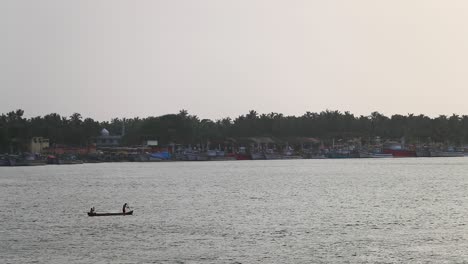 Indian-Fisherman-Crossing-The-River,-Mangalore,-India