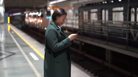 happy businesswoman return home chatting in social media with family, husband wait for subway train