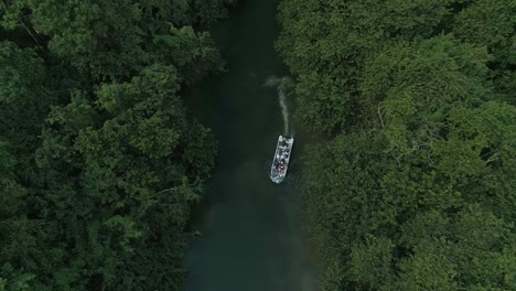 turistic boat on river crossing humedales del ozama national park in dominican republic