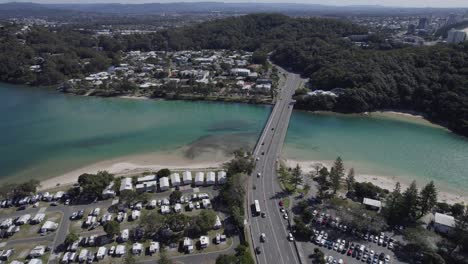 aerial view of tallebudgera creek bridge in the city of gold coast, queensland, australia