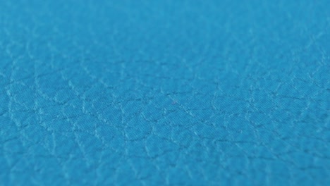 a detailed macro close up shot of a blue abstract texture pattern material, cinematic movement, slow motion 120 fps, full hd