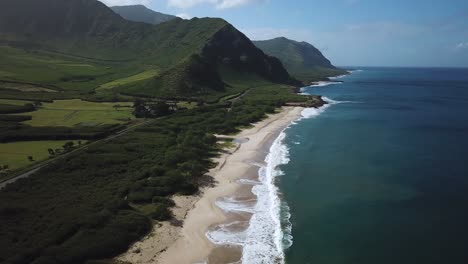 beautiful white sand beaches on tropical island in hawaii, aerial tilt-up