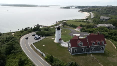 aerial view over nobska lighthouse in falmouth, massachusetts - drone shot