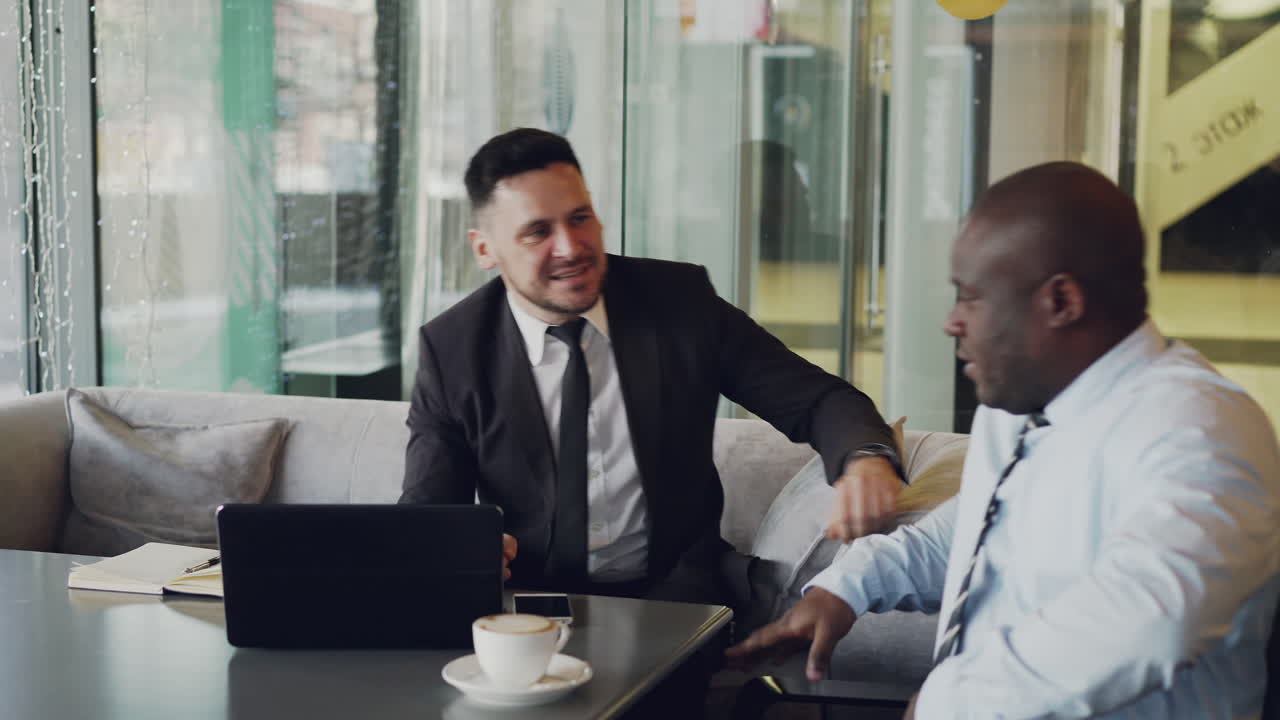 Business Meeting in a Coffee Shop