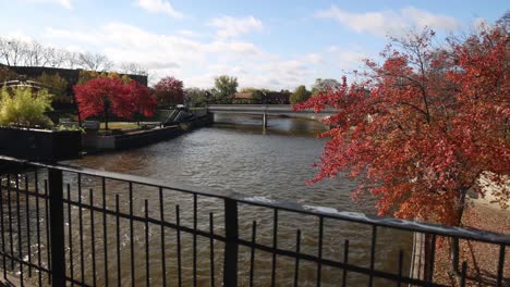 Flint-River-in-Flint,-Michigan-gimbal-video-walking-along-bridge