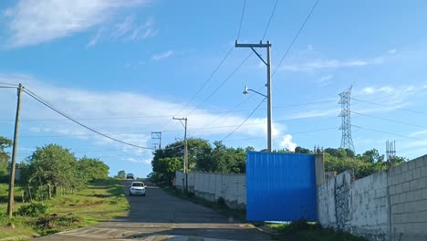 POV-driving-shot-through-the-streets-of-Argentina-with-a-open-metal-gate