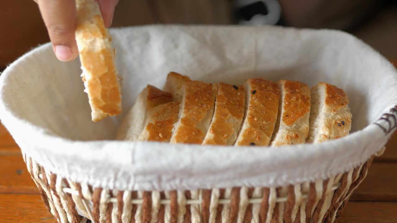 Slices of bread in a wicker basket
