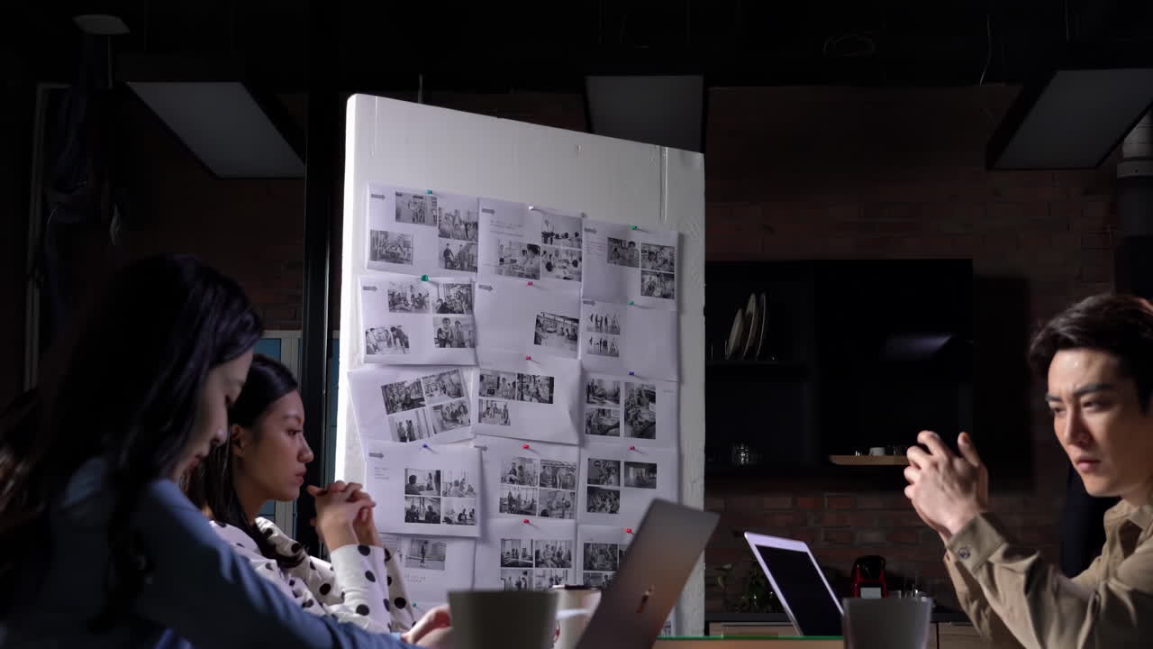 Professional business team meeting tension escalating, male leader colleagues arguing intensely over paperwork, displaying workplace stress, interpersonal conflict during corporate heated discussion