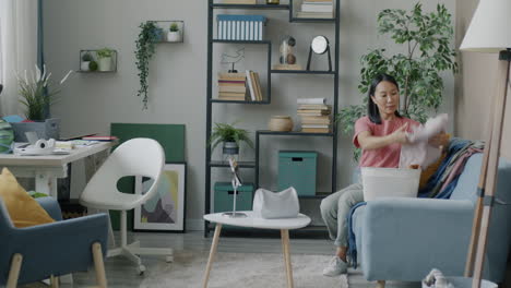 woman cleaning up at home