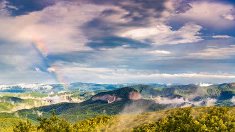 rainbow in clouds over blue ridge mountains north carolina cinemagraph