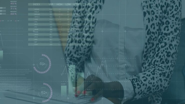 Business analyst typing on laptop and activating floating finance charts for market data analysis