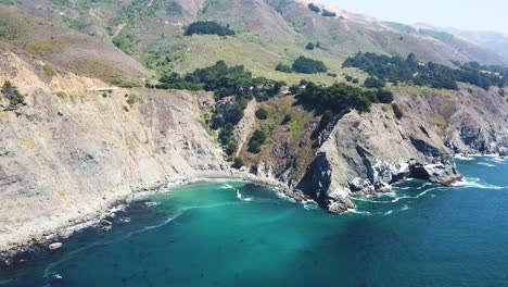 aerial panoramic view over sea and rocky cliffs