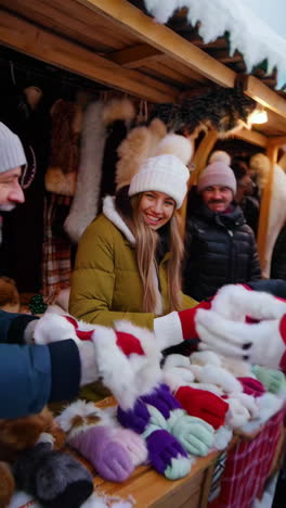 winter market scene with people browsing stalls